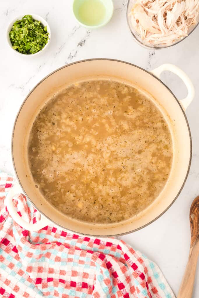 Pot of simmering White Chicken Chili base before adding the chicken, lime juice, and cilantro.