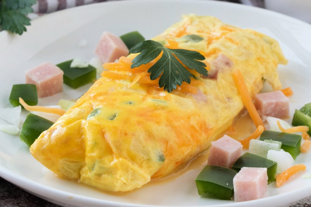 omelet in a bag on a white plate