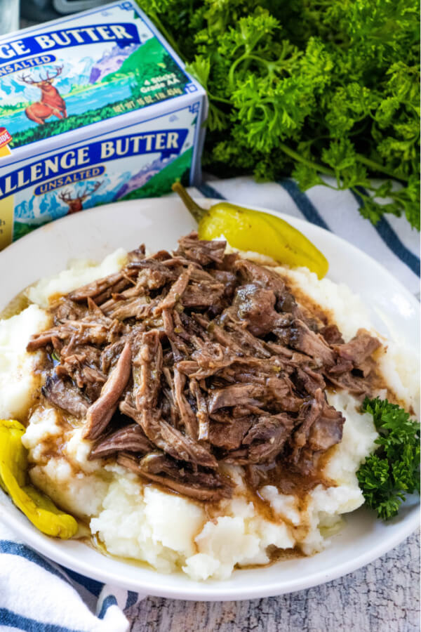 mississippi pot roast with gravy over mashed potatoes