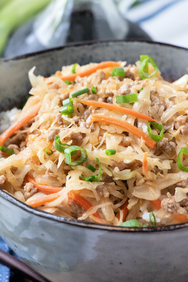 closeup of finished egg roll in a bowl in a bowl