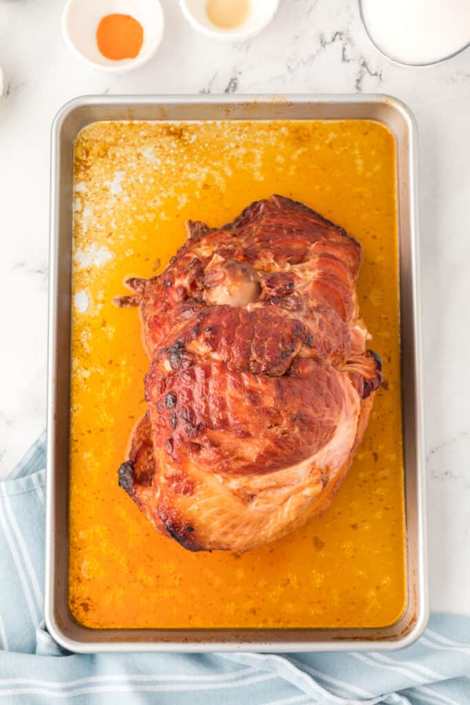 Remove the ham from the oven, remove the foil and turn the oven to broil.
