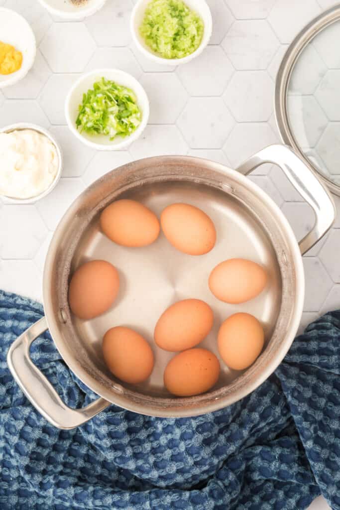 Hard-boil the eggs: Add the eggs to a medium saucepan and add cold water to where it is just covering the eggs.  