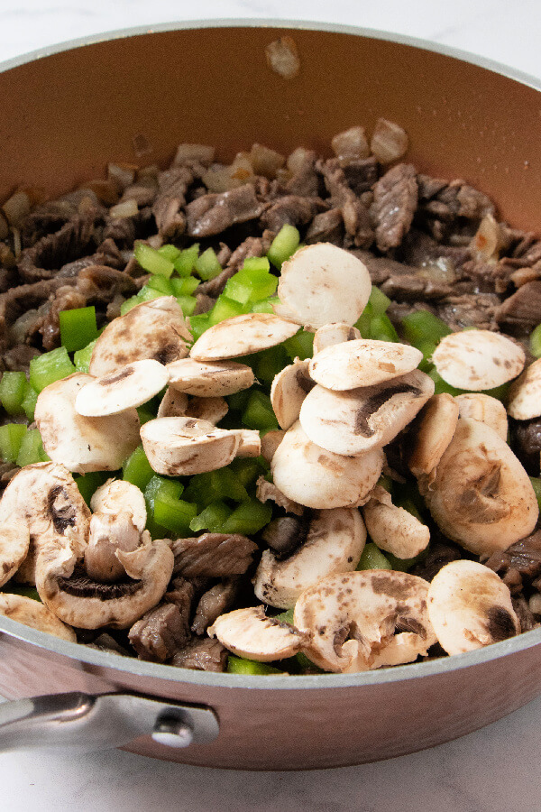 mushrooms added to the pan