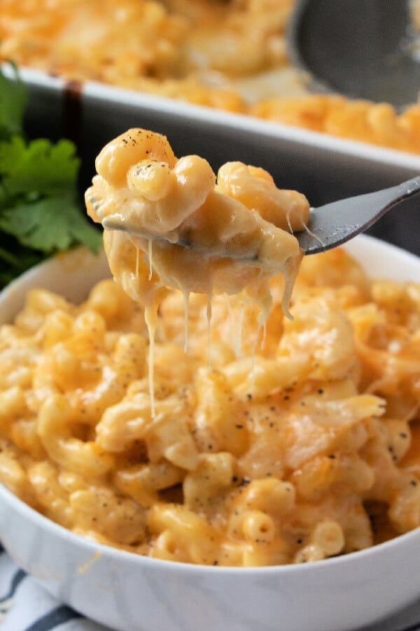 a bite of mac and cheese on fork