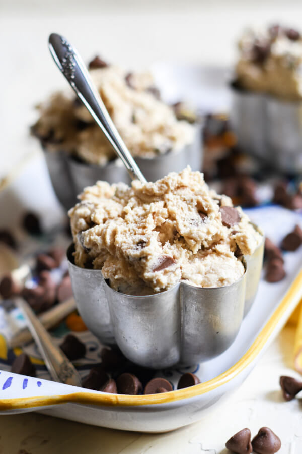 bowl of edible cookie dough with a spoon in it