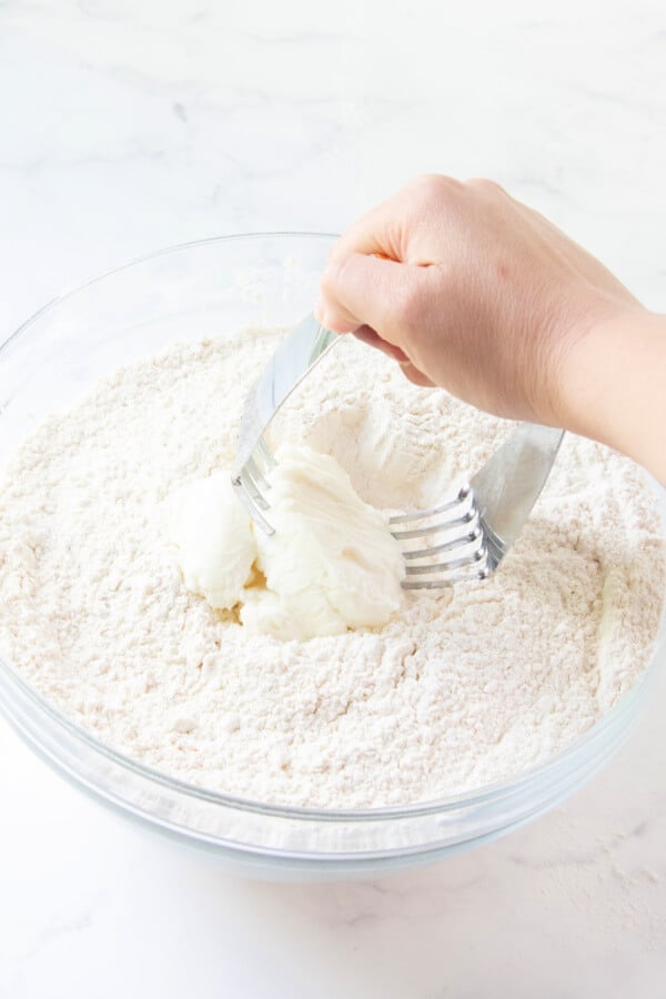 cutting shortening into the flour mixture