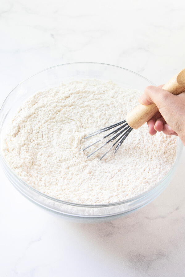 whisking the flour mixture to combine the ingredients