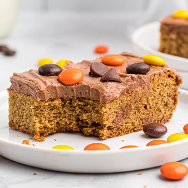 closeup of peanut butter cookie bar on white plate