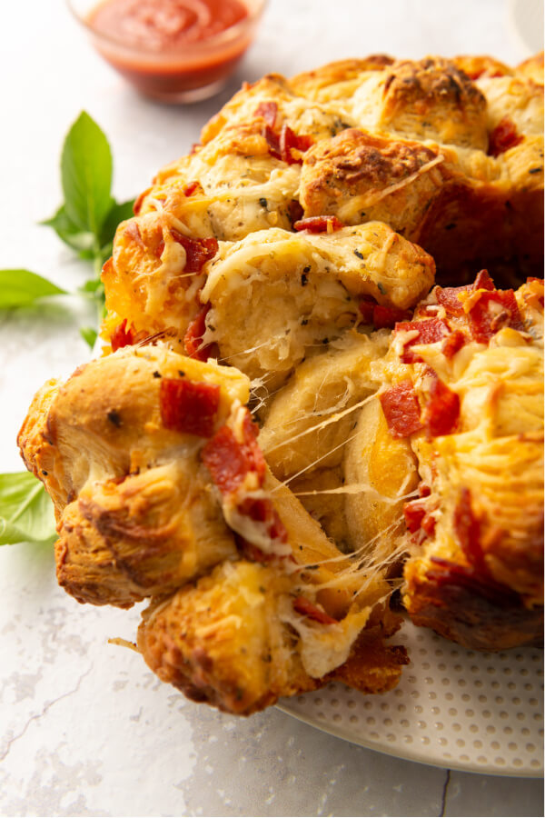 pepperoni pizza monkey bread wil a piece pulled out