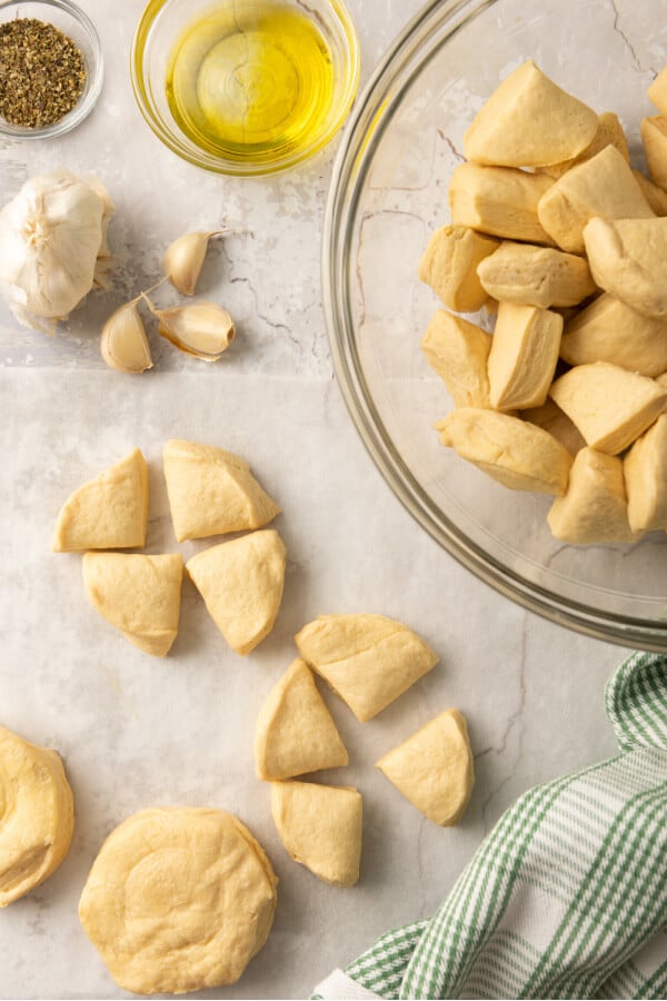 cutting the biscuits into quarters