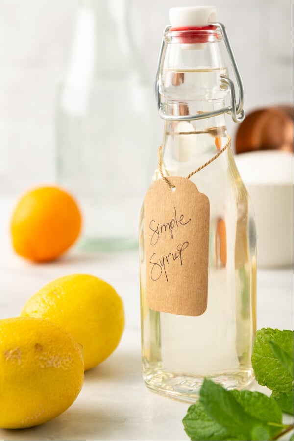 simple syrup in glass bottle