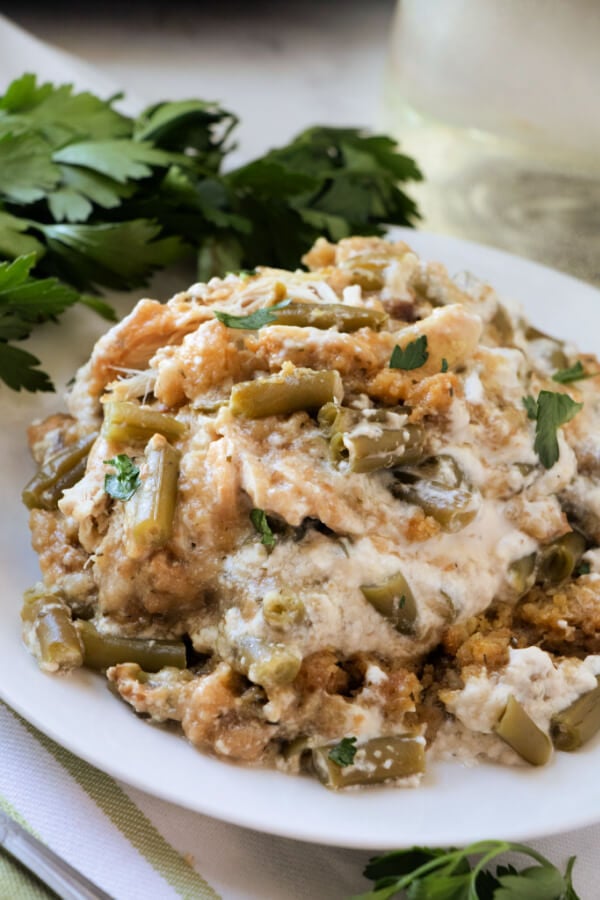 Slow Cooker Chicken Stuffing Green Bean Casserole on white plate