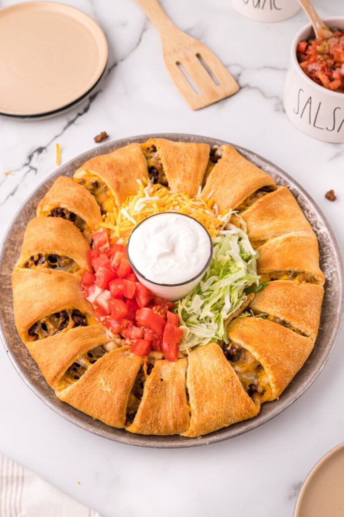 taco ring with crescent rolls on platter