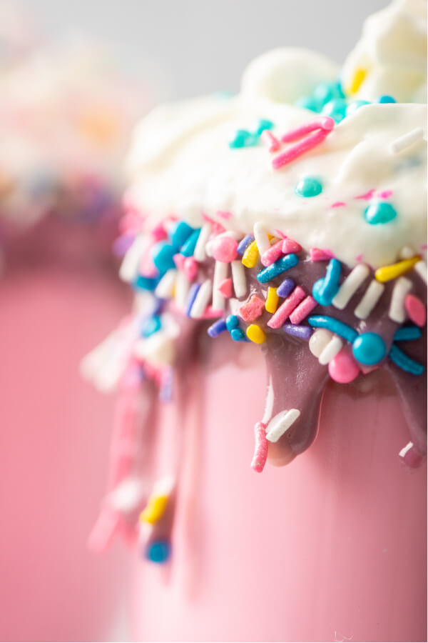 closeup of unicorn hot chocolate in glass mug