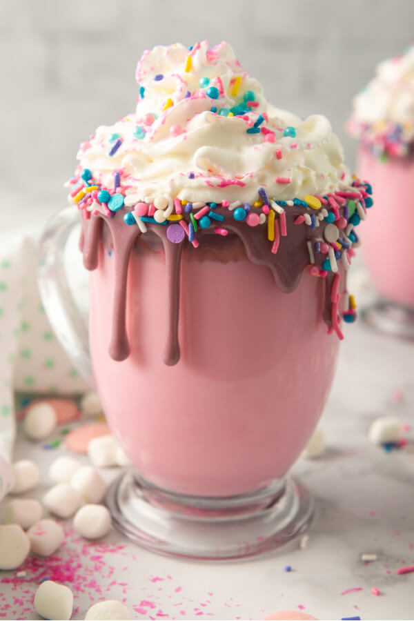 unicorn hot chocolate in glass glass mug