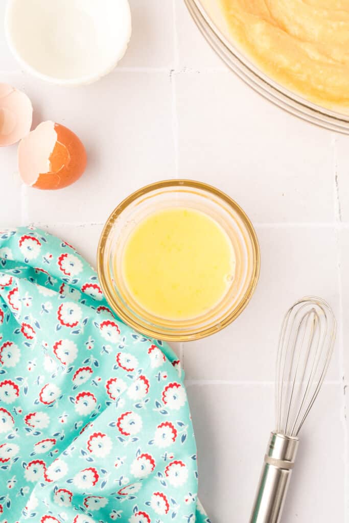 Make an egg wash with the remaining egg and 1 tablespoon water, whisk together, and set aside.