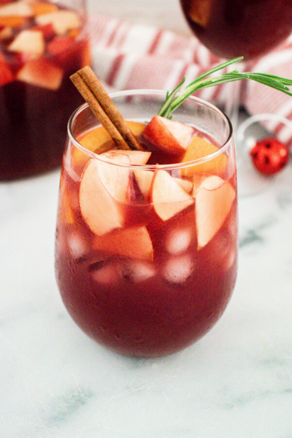 holiday sangria in a stemless wine glass