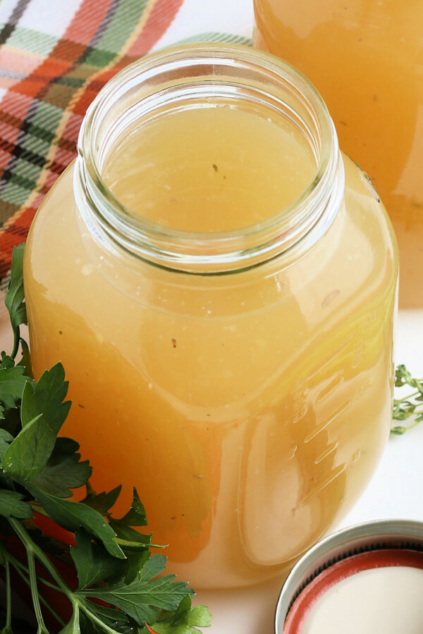 homemade turkey stock in glass jar