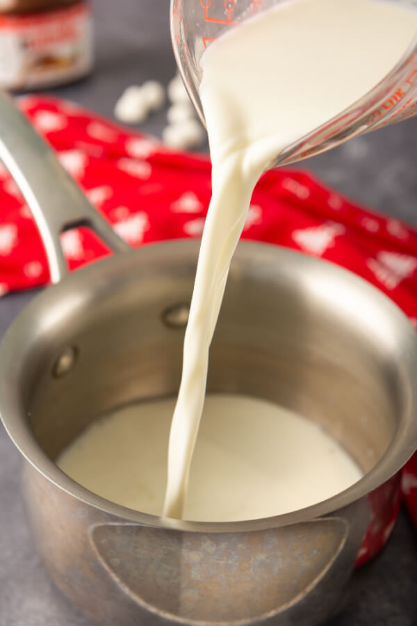 pouring milk in to pan