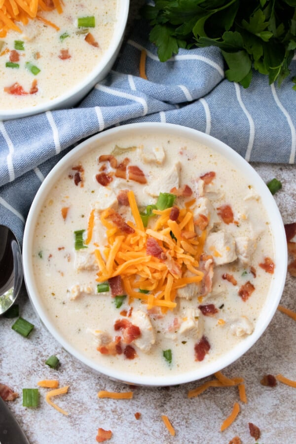 chicken bacon ranch soup aka crack chicken soup in bowl with blue linen