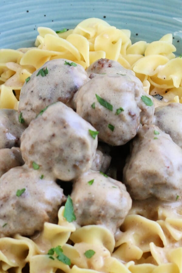 closeup of finished Swedish Meatballs over noodles