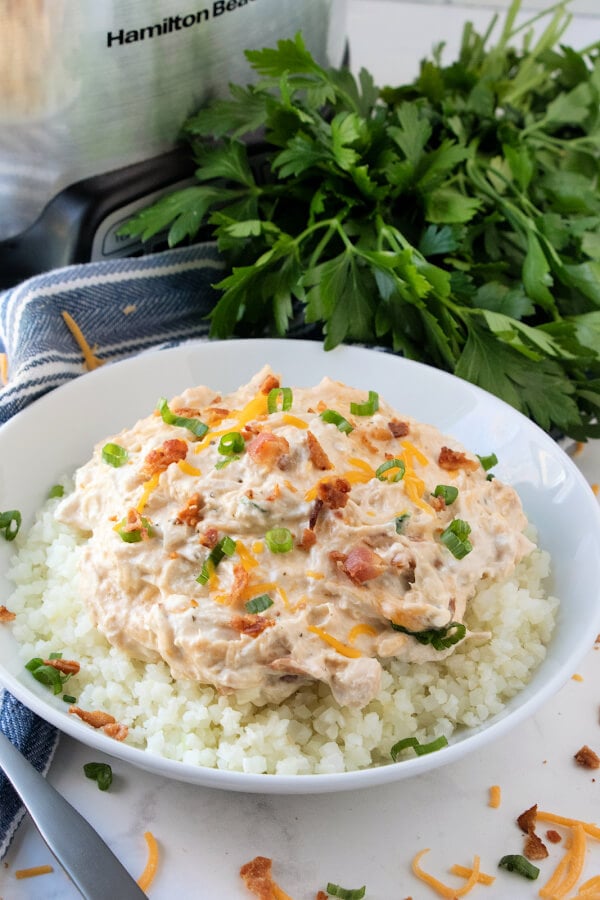 chicken mixture and cauliflower rice in bowl