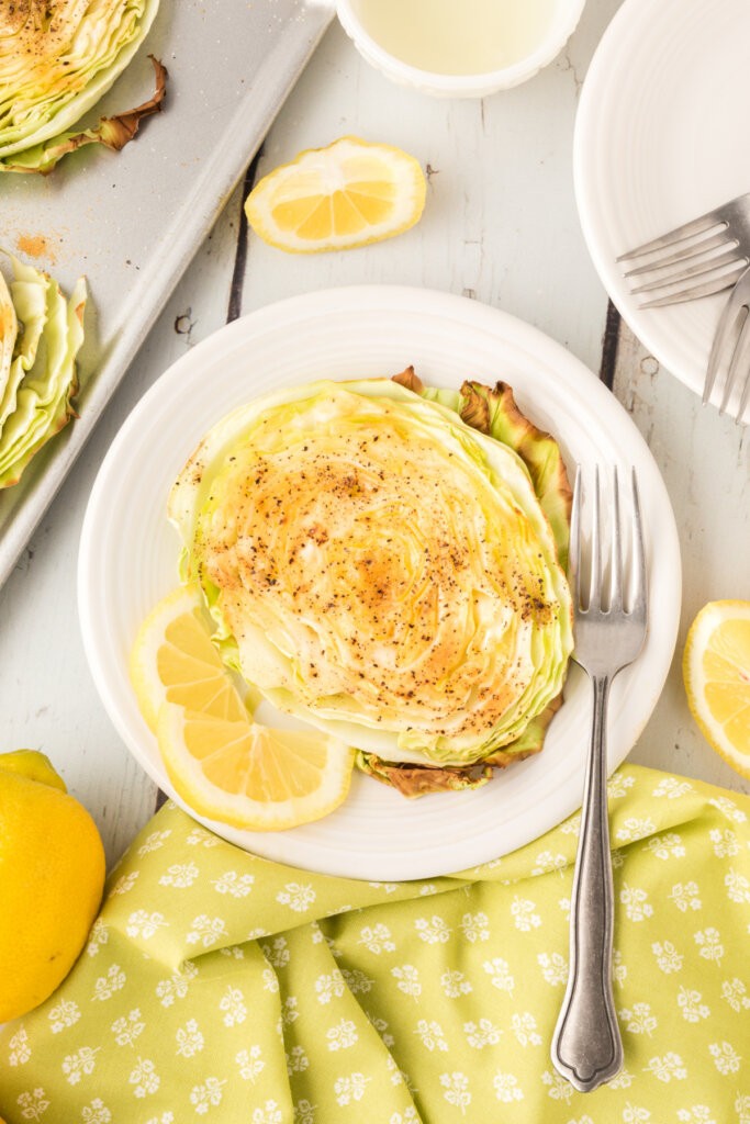 slice of garlic butter roasted cabbage on plate