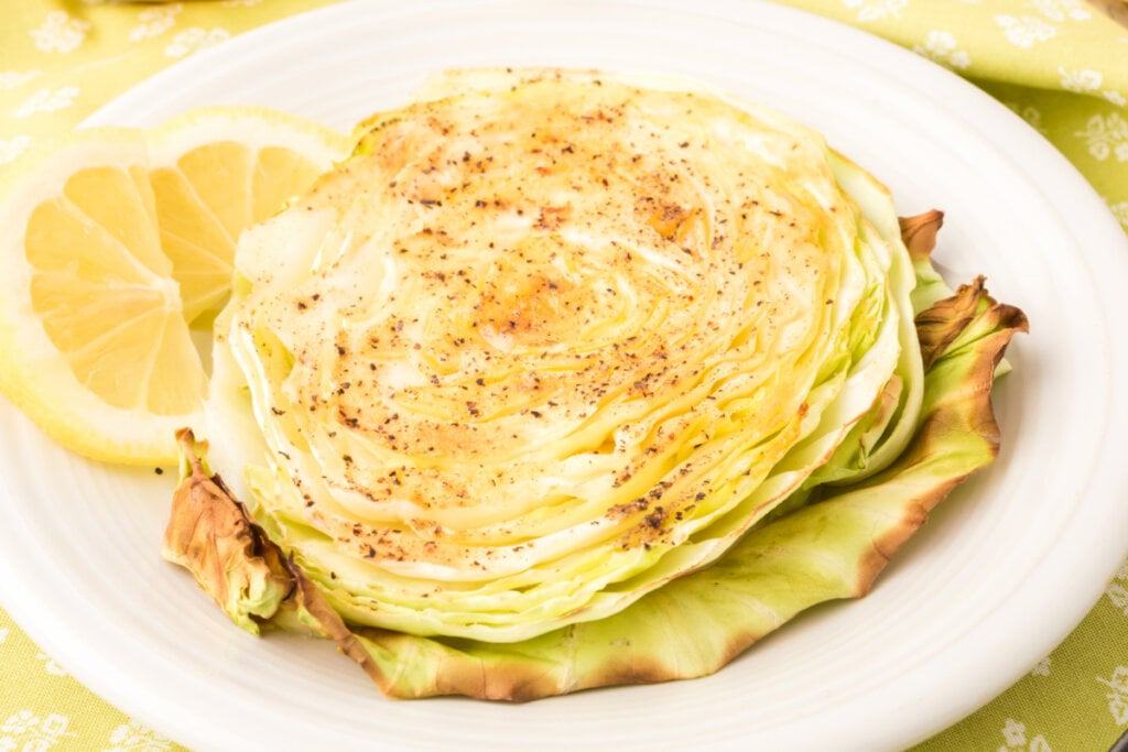 slice of garlic butter roasted cabbage on plate