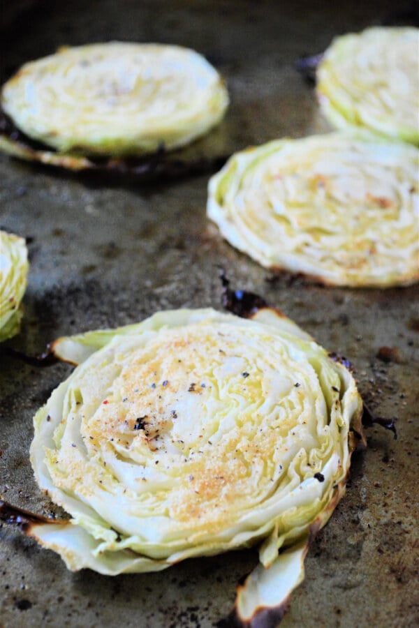 cabbage that has been roasted on a baking sheet