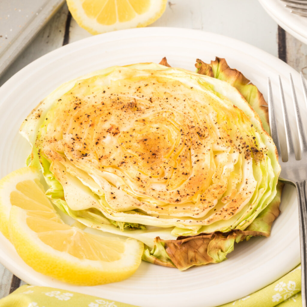 garlic butter roasted cabbage on plate