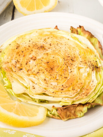 garlic butter roasted cabbage on plate