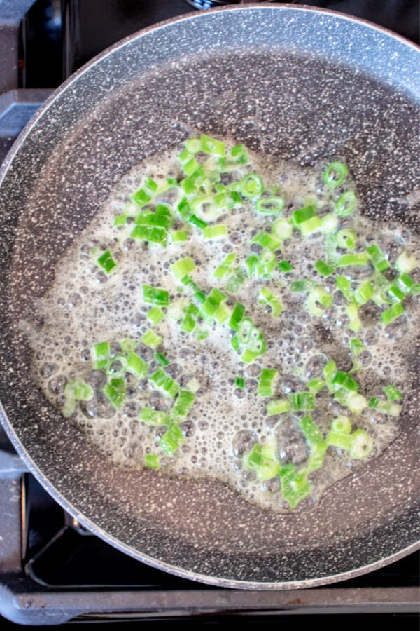 sauteeing green onions in butter