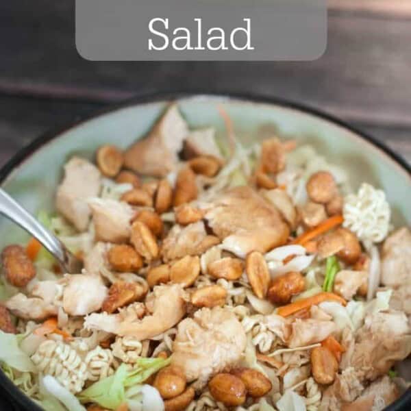 Asian Chicken Salad in a bowl with a fork.