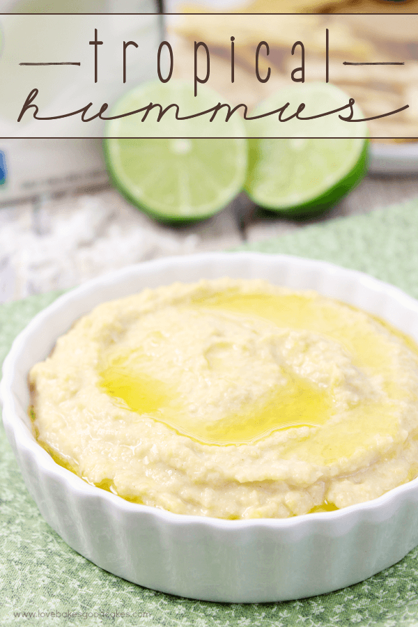 Tropical Hummus in a white bowl with a lime.