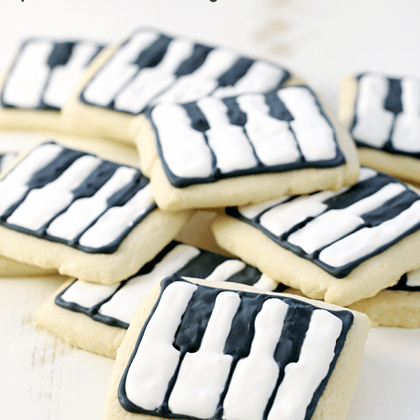 Schroeder's Piano Key Cookies stacked up on a cutting board.