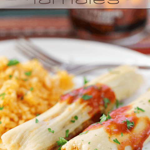 Chipotle Chicken Tamales on a plate with Mexican rice and a fork.