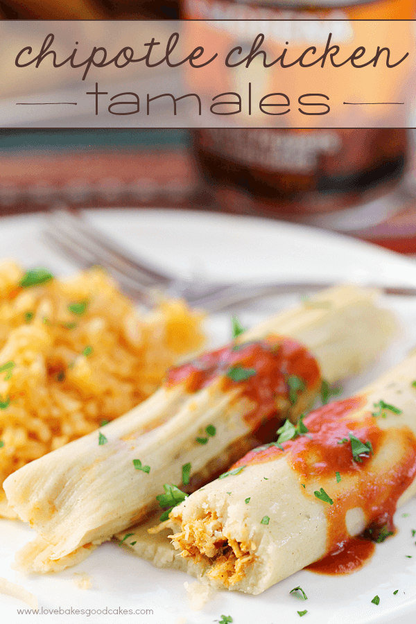 Chipotle Chicken Tamales on a plate with Mexican rice and a fork.