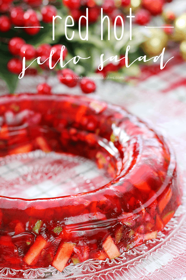 Red Hot Jello Salad on a clear cake plate.