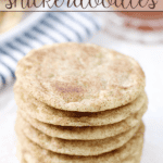 Caramel-Studded Snickerdoodles stacked up on a white plate.