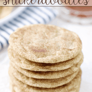 Caramel-Studded Snickerdoodles stacked up on a white plate.