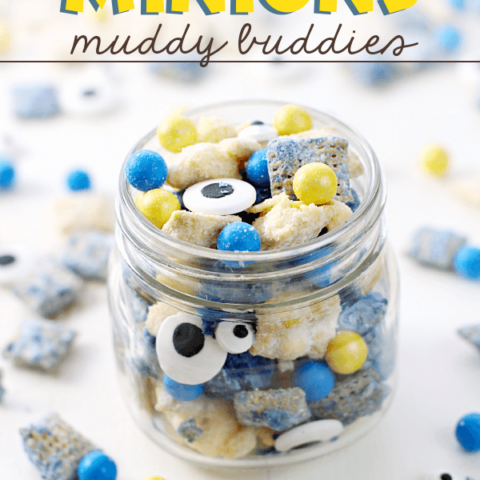 Banana Berry Minions Muddy Buddies in a jar with pieces laying around the jar.