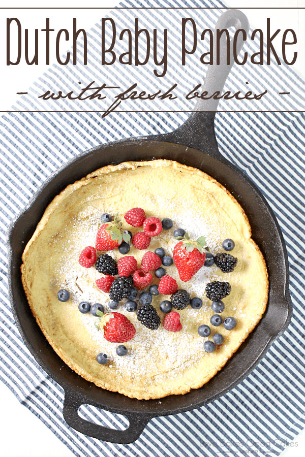 Dutch Baby Pancake with Fresh Berries in a skillet.