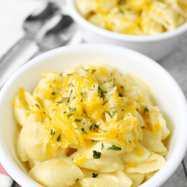 Rice Cooker Mac & Cheese in a white bowl, close up.