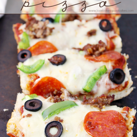 French Bread Pizza on a cutting board.