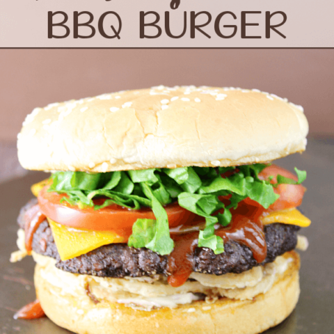 Copycat Red Robin Whiskey River BBQ Burger on a cutting board.