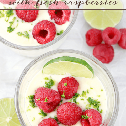 Lime Posset with Fresh Raspberries in two bowls with fresh fruit.