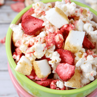 Strawberry Shortcake Popcorn in a green bowl.