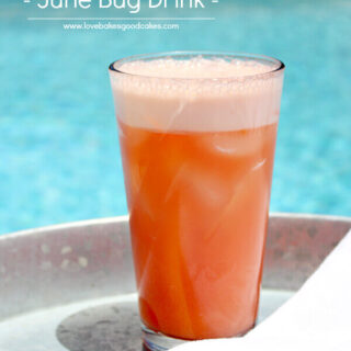 June Bug Drink in a glass by the pool.