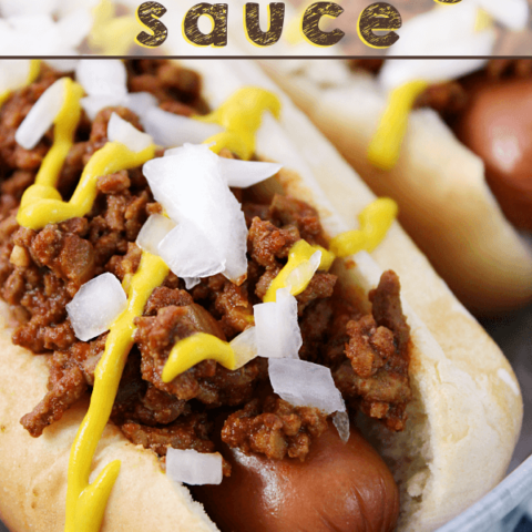 Meaty Chili Dog Sauce and hotdog laying in a metal bowl.