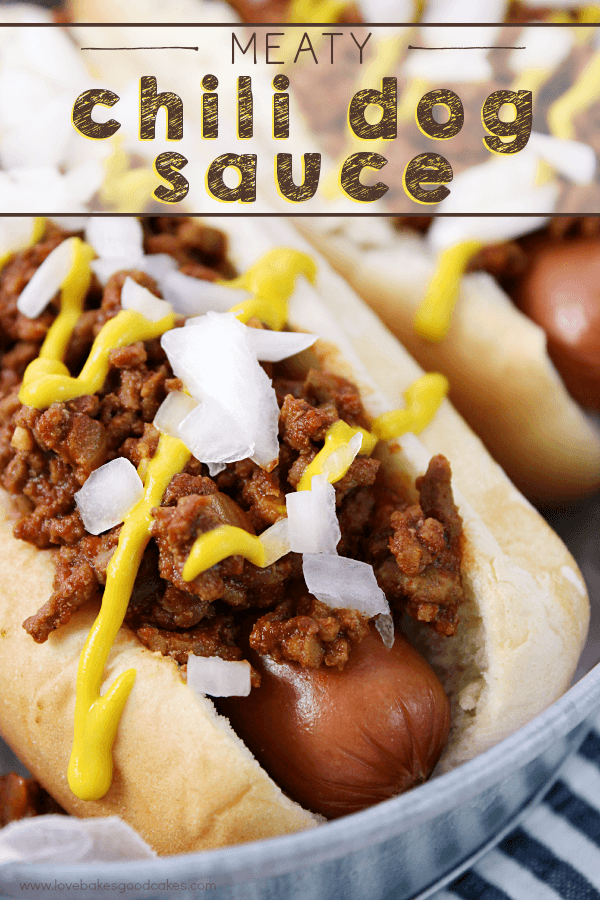 Meaty Chili Dog Sauce and hotdog laying in a metal bowl.